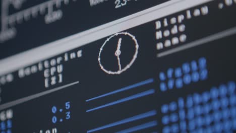 Rack-focus-shot-of-a-computer-screen-with-system-analytics-and-CPU-performance-metrics