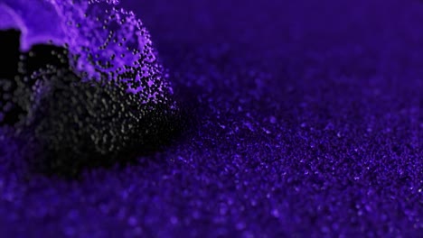 abstract purple and black liquid particles