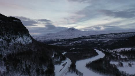 explore pristine snow-covered peaks and serene landscapes of northern norway’s saltfjellet mountains through captivating drone footage shot inside the enchanting arctic circle