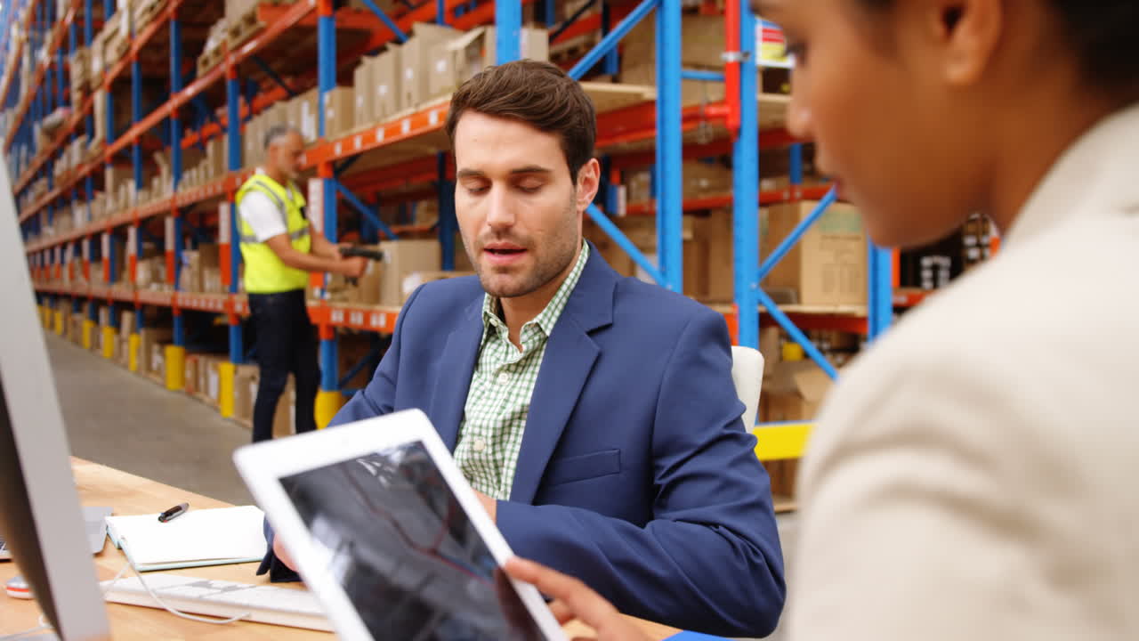 Warehouse workers working together 