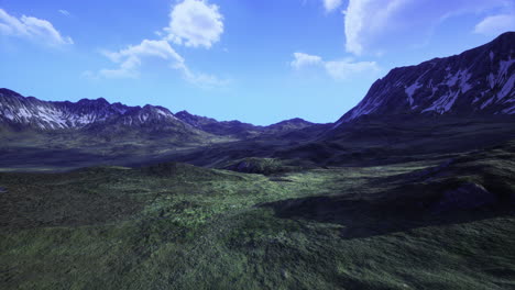 expansive landscape with mountains and vibrant skies during daylight hours