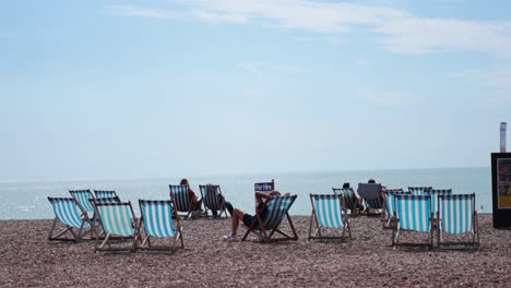 people enjoying a sunny day by the sea