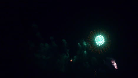 beautiful abstract colourful fireworks explode display on sky at night a symbol of celebration in new years anniversary for background