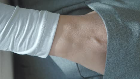 close-up of hand in pocket