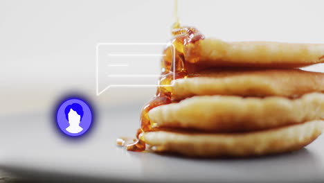 pouring syrup over pancakes, animated chat bubble appearing