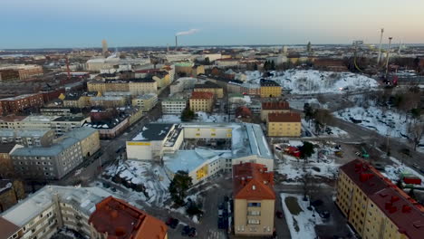 An-aerial-drone-shot-that-travels-slowly-over-an-industrialised-section-of-an-urban-environment