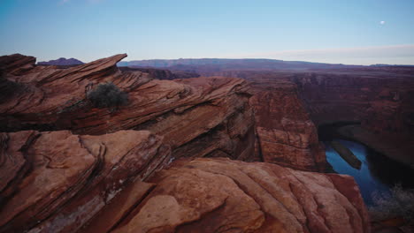 Gimbal-shot-of-river-valley-with-canyon