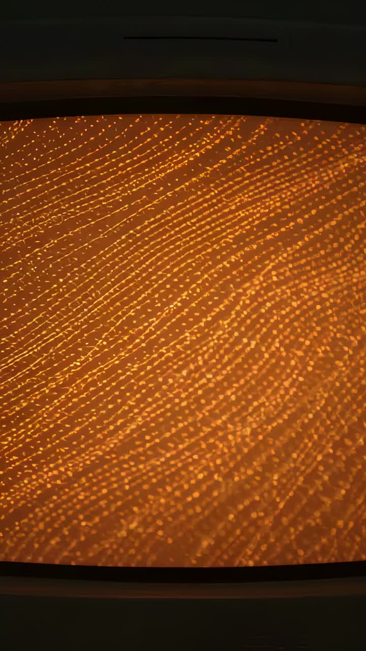 Vertical video: Shifting amber lit panel showing moving dotted lines inside cabin, from camera tilt