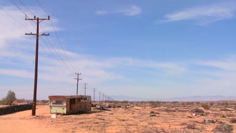 An-abandoned-trailer-sits-in-the-middle-of-the-Mojave-desert-1