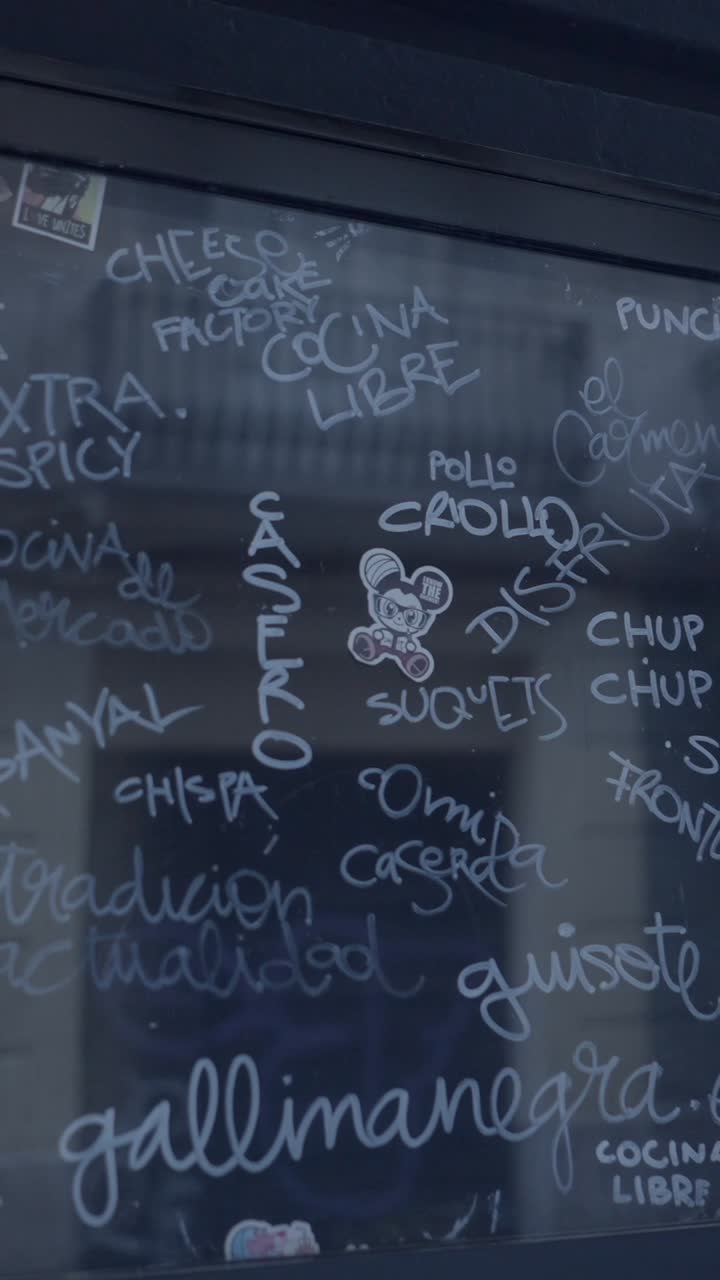 Chalkboard with Spanish Writing and Cartoon Sticker