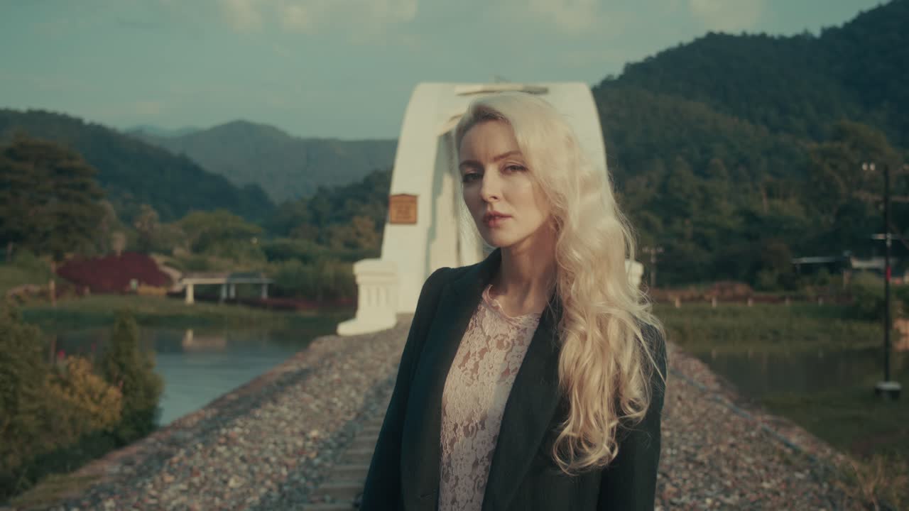 Woman on a Railroad Bridge