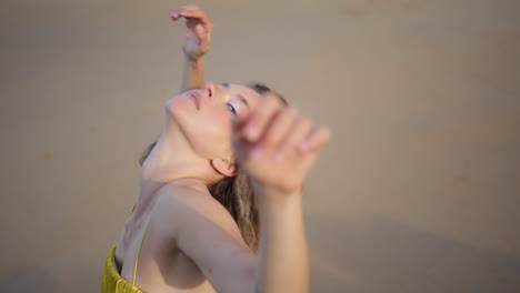 sensual girl dancing hands on nature evening sunlight close up. woman dancer