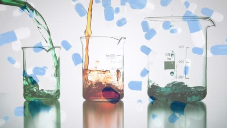 beakers being filled with liquid and capsules