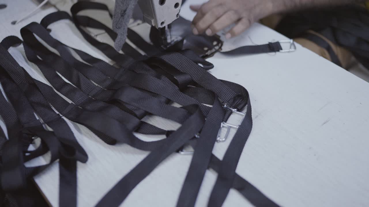 Sewing Straps in a Factory
