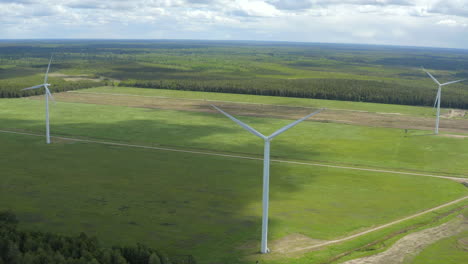 wide orbit shoot on wind farm in northern europe in summer