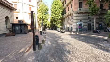 empty cobblestone street with historic buildings