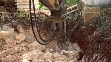 Slow-motion-of-an-hydraulic-hammer-drilling-pales-rocks-from-the-yucatan-peninsula