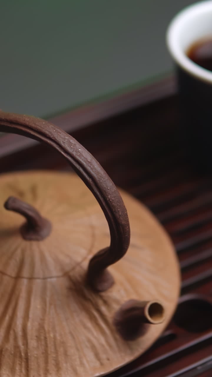 Close-up of a traditional Chinese tea pot and cup