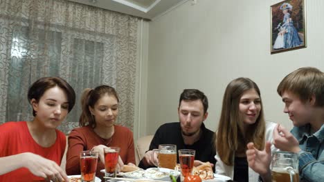 friends enjoying dinner party at home