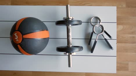 workout equipment on a white mat