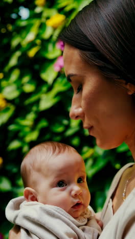 a mother and baby sharing tender moments outdoors