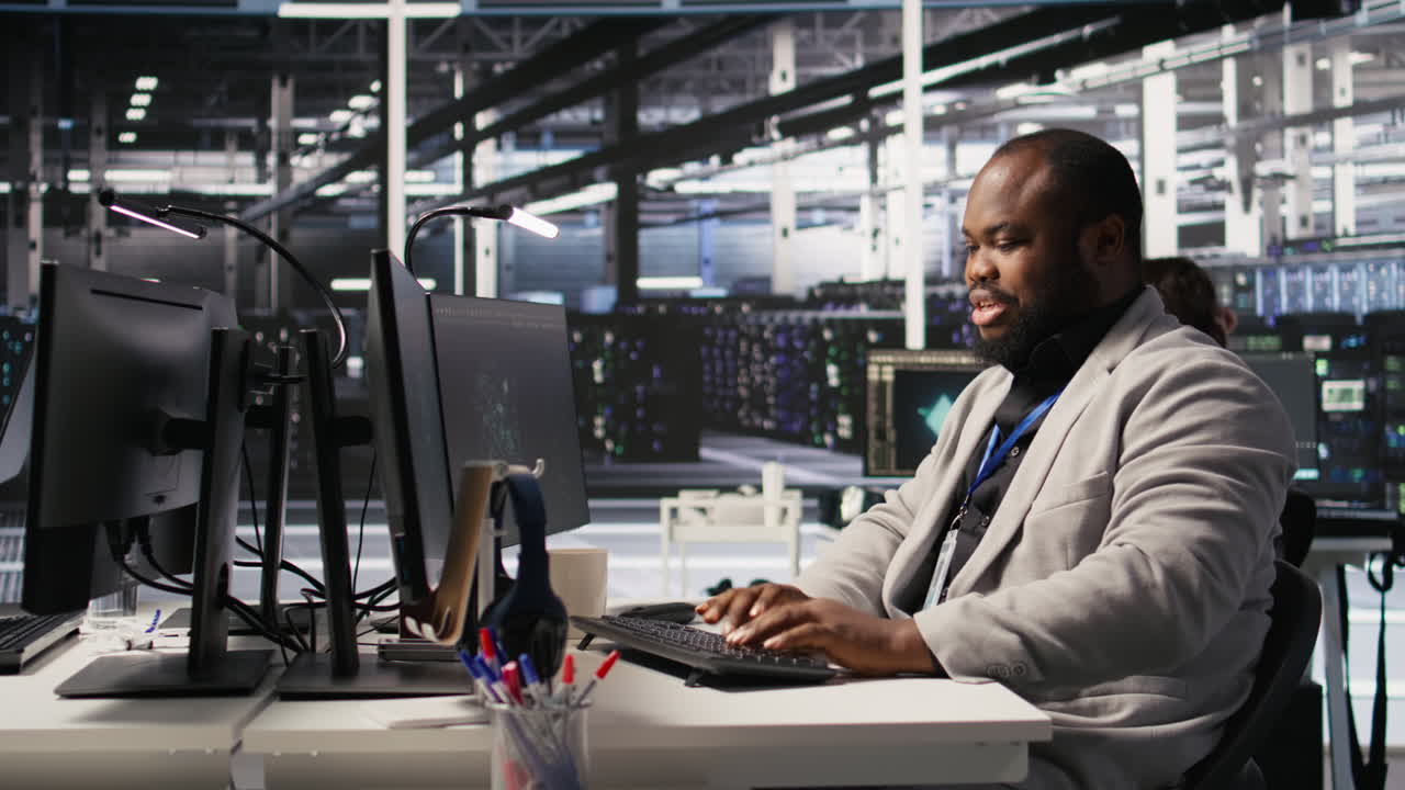 Vertical video Data center system administrator monitoring servers gear performing AI training