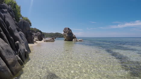 white sand and clear sea water in a virgin island in philippines 4k