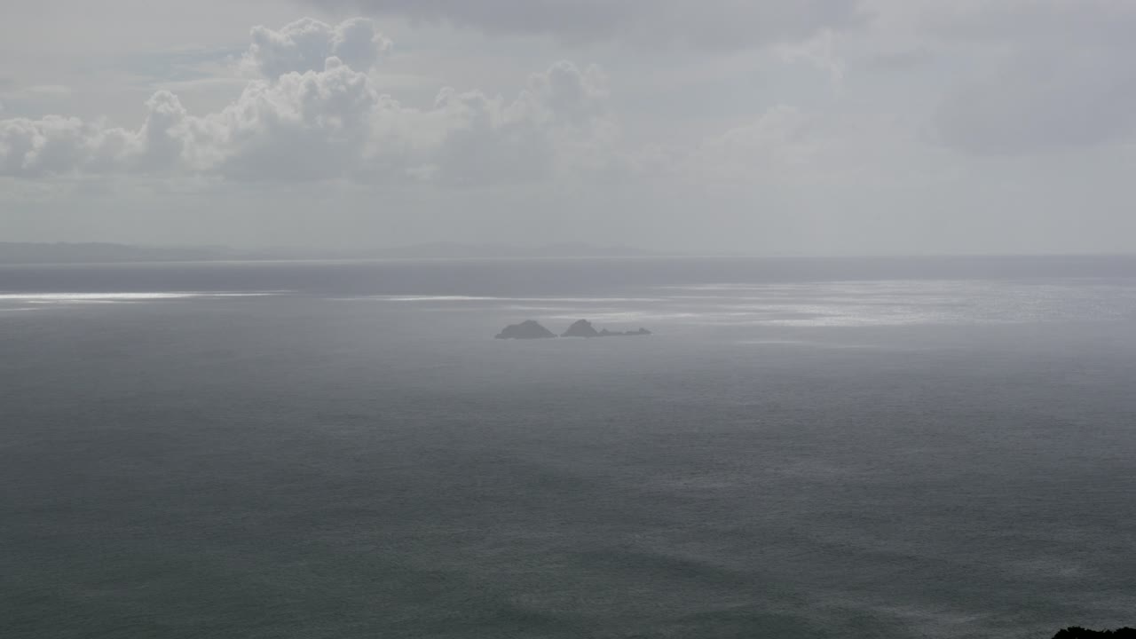 Nguthungulli Julian Rocks Nature Reserve in Byron Bay Australia, cloudy sky