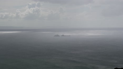 nguthungulli julian rocks nature reserve in byron bay australia, cloudy sky