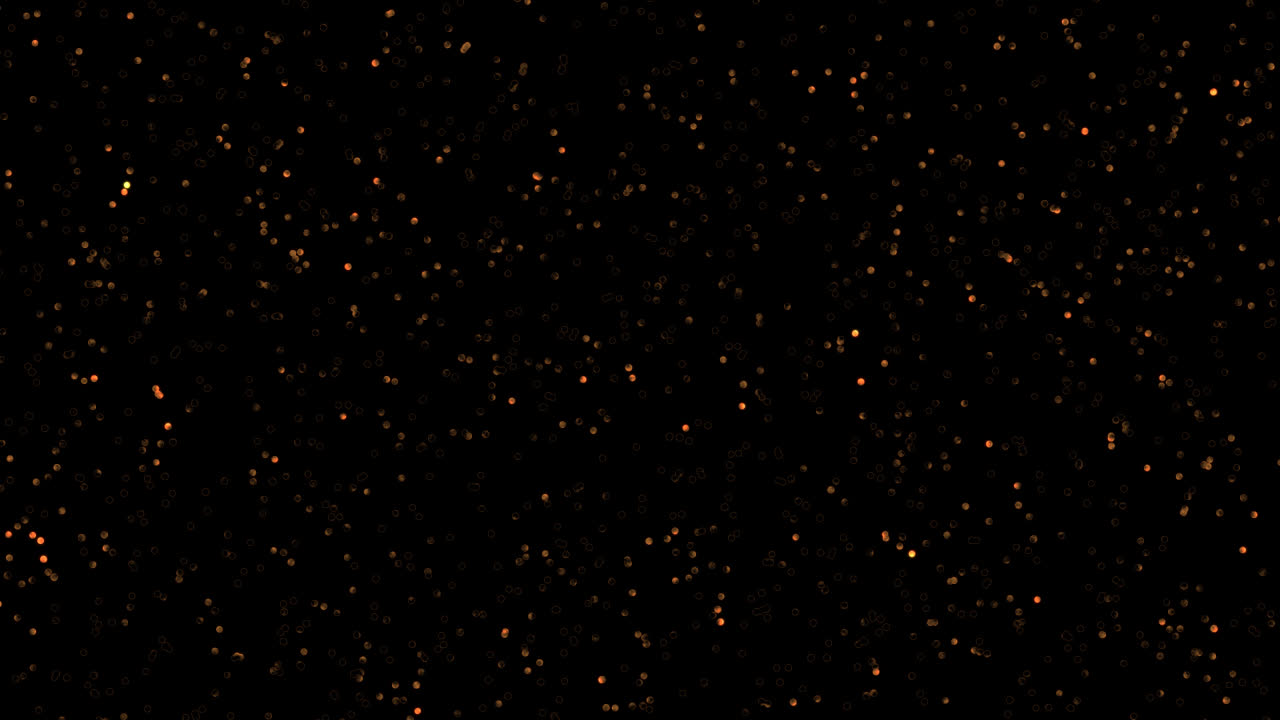 Luci bokeh calde astratte tremolanti su sfondo scuro