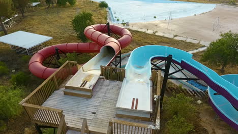 Drone-shot-of-water-slides-at-abandoned-waterpark-Breakers-in-Tucson-Arizona