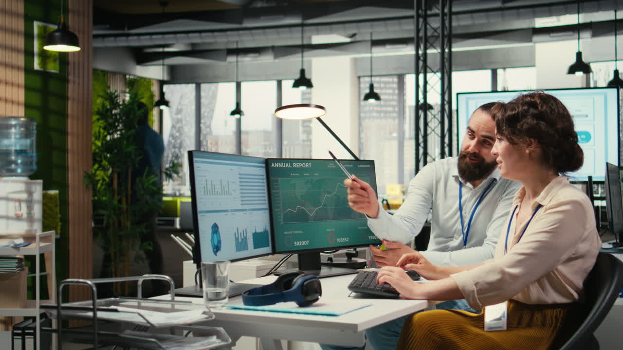 Vertical Video Business partners engaging in a discussion about financial forecasting