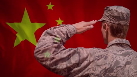 animation of flag of china over caucasian male soldier saluting