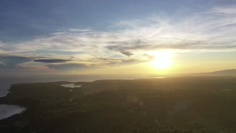 Beautiful-aerial-view-of-a-coast-in-Negros-Oriental,-Philippines,-at-sunrise