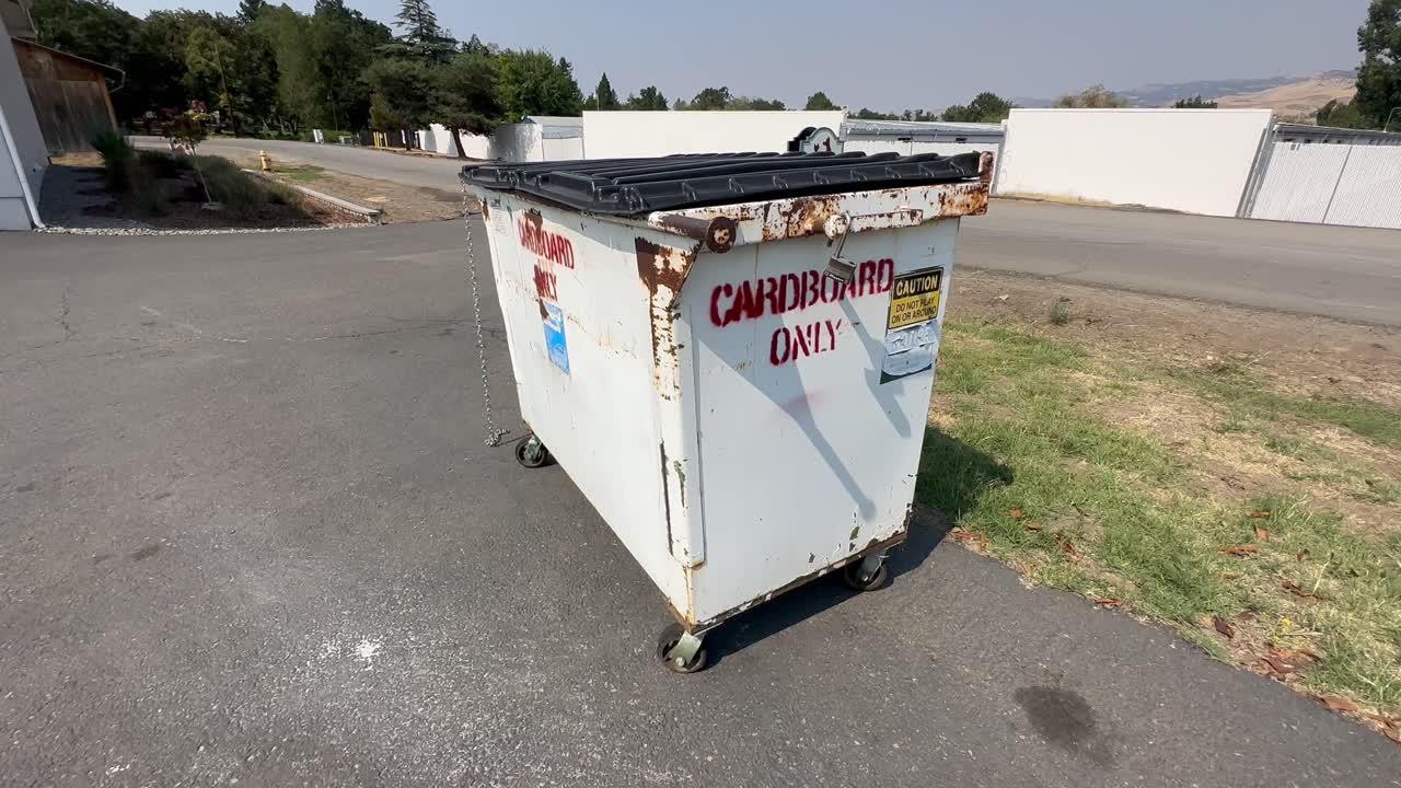 A shut dumpster for cardboard recycling Premium Stock Video Footage