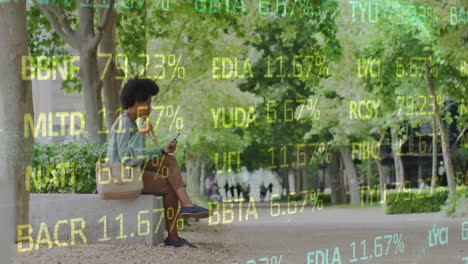 animation of african american woman sitting in park and eating food while using on cellphone