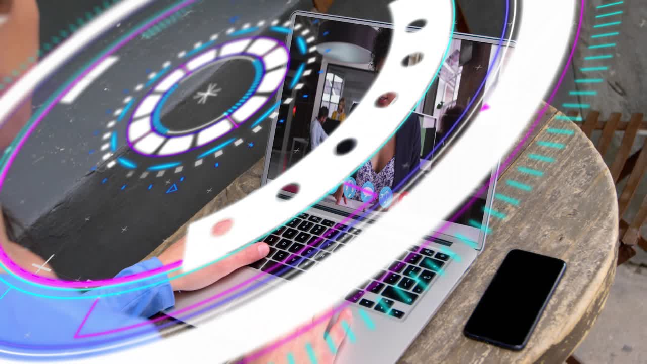 Laptop user typing keys and activating rotating HUD, revealing caller gestures for business meeting