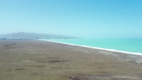 Vast-landscape-contrasting-with-beautiful-colors-of-ocean-and-sky