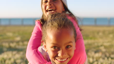 friends, piggyback and girls playing in nature by