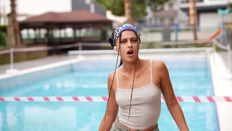 teenager near a closed pool