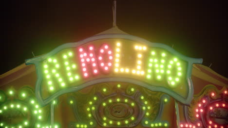 Shot-of-a-carnival-machine-with-lights-and-the-word-"remolino"