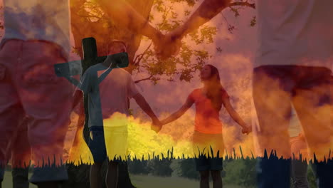 holding hands under tree, silhouetted couple with sunset and cross animation