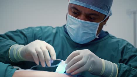 a surgeon meticulously performs a critical medical procedure, displaying concentration and skill while ensuring patient safety under sterile conditions in the operating room.