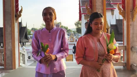 thai women in ceremony at temple