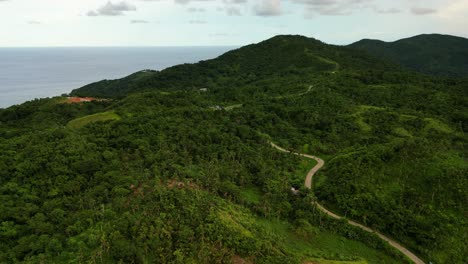 Mountains Covered With Dense Forests In Buenavista, Bato, Catanduanes, Philippines. Aerial Drone Shot