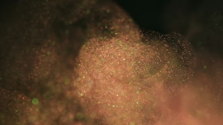 Lo spruzzo di particelle colorate. Slow motion