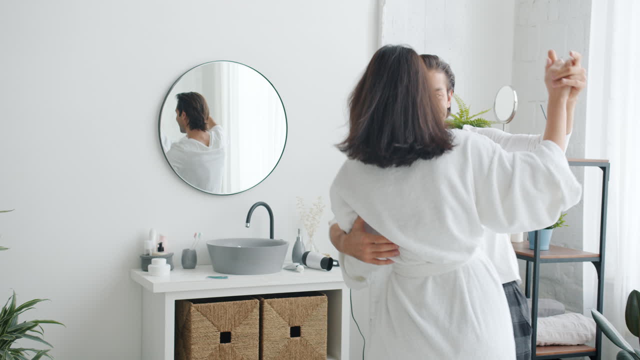 Couple Dancing in Bathroom