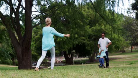 Father-swinging-his-daughter-around-by-her-arms