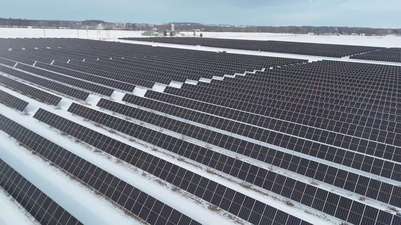 During the winter, a Wisconsin field of solar panels absorbs the sun's energy and converts it to electricity.