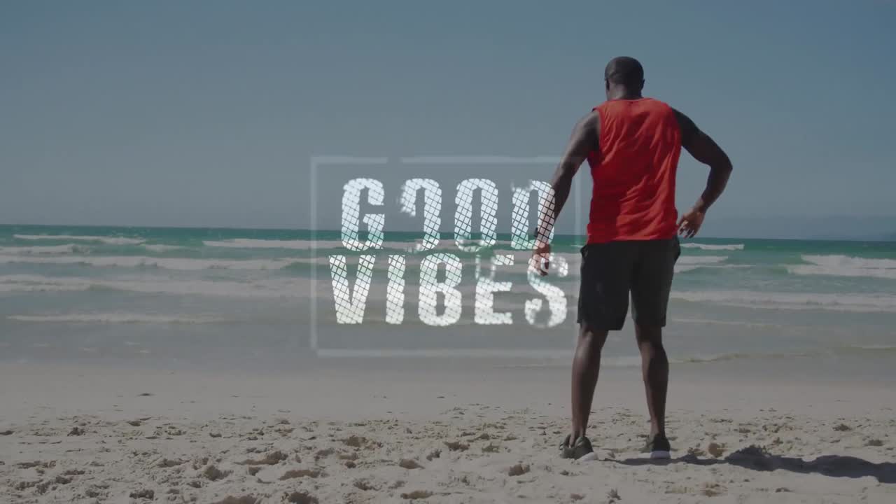 animación de buenas vibraciones texto con hombre afroamericano estirándose en la playa